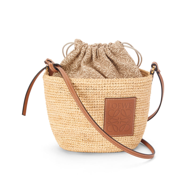 Pochette bag in raffia and calfskin