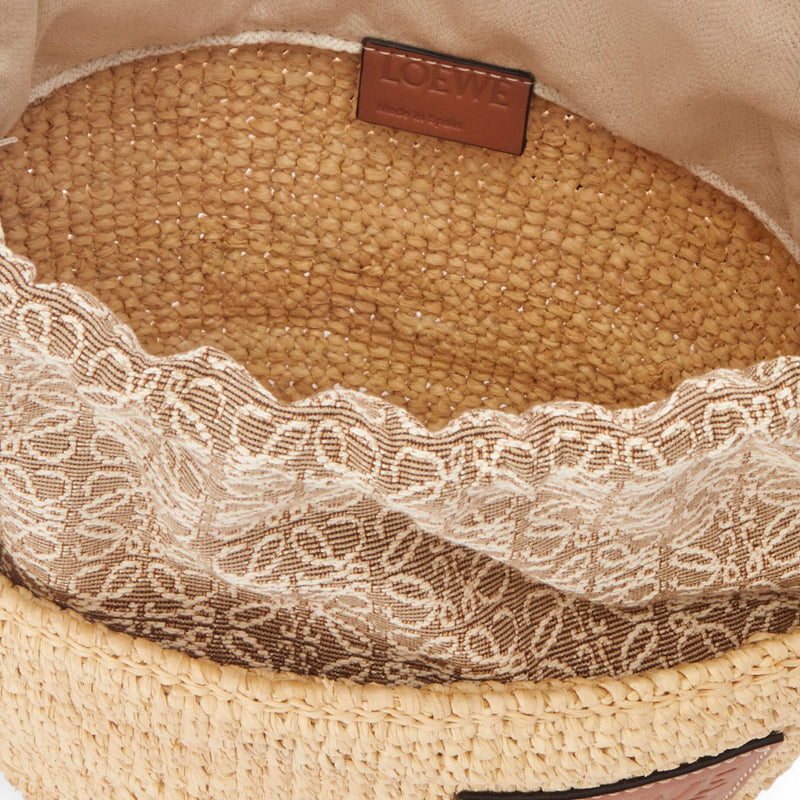 Pochette bag in raffia and calfskin