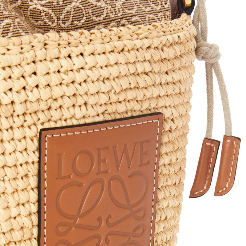 Pochette bag in raffia and calfskin