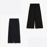 Wide-fit stretch wool trousers