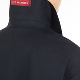 Short trench coat in water-repellent twill