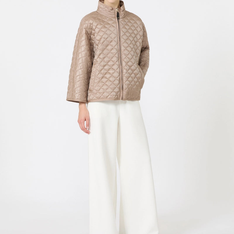 Reversible padded cape in water-repellent canvas