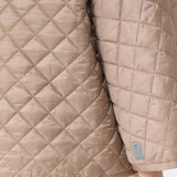 Reversible padded cape in water-repellent canvas