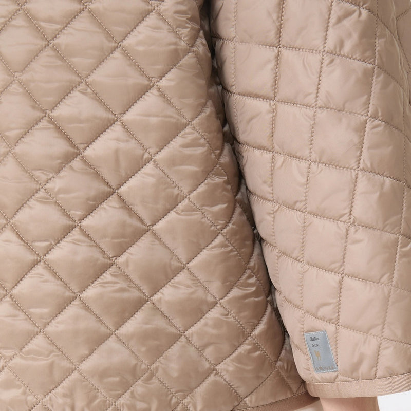 Reversible padded cape in water-repellent canvas