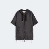 Quilted hooded cape in water-repellent canvas