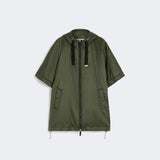 Quilted hooded cape in water-repellent canvas