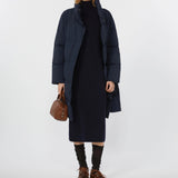 Down jacket in water-repellent technical fabric