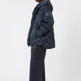 Padded jacket in water-repellent iridescent fabric