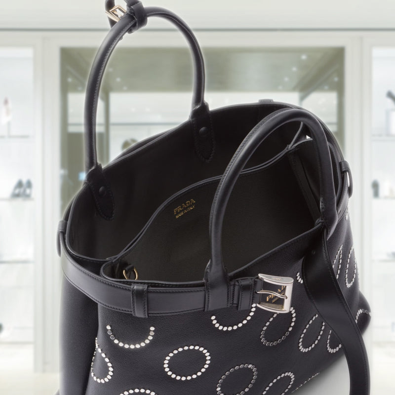 Prada Buckle large leather bag with appliqués