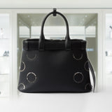 Prada Buckle medium leather bag with appliqués