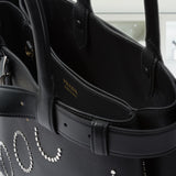 Prada Buckle medium leather bag with appliqués