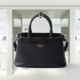 Prada Buckle small leather handbag with double belt