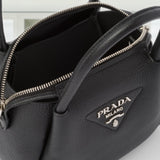 Leather mini handbag with zipper closure