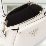 Leather mini handbag with zipper closure