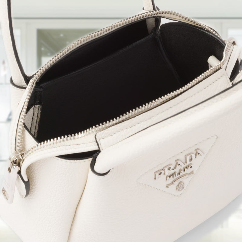 Leather mini handbag with zipper closure