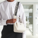 Leather mini handbag with zipper closure