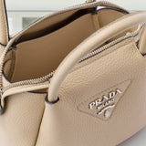 Leather mini handbag with zipper closure