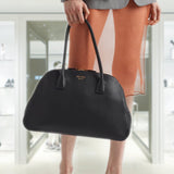 Medium leather tote bag with zipper closure