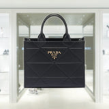 Small leather Prada Symbole bag with topstitching