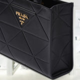 Small leather Prada Symbole bag with topstitching