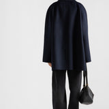 Double-breasted cashgora coat