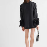 Single-breasted wool jacket with feather trim