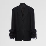 Single-breasted wool jacket with feather trim