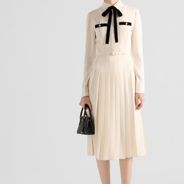 Long pleated satin sablé dress
