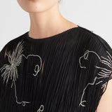 Embroidered dress with fringe