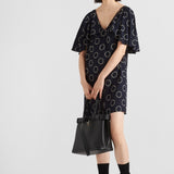 Printed sablé mini-dress
