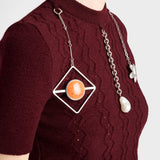 Short-sleeved wool sweater with pendants