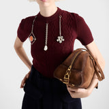 Short-sleeved wool sweater with pendants