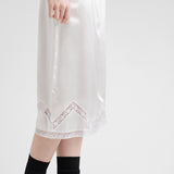 Embroidered satin skirt