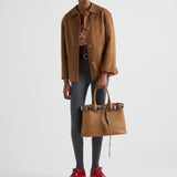 Prada Buckle large leather bag with studded belt