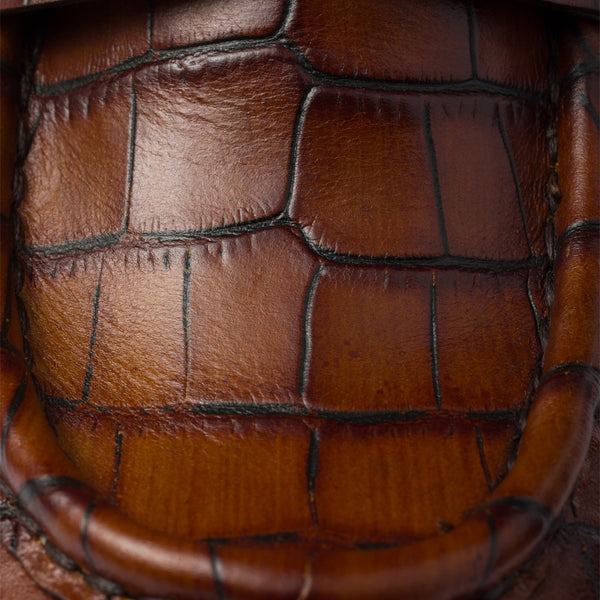Chocolate crocodile-print leather loafers