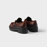 Chocolate crocodile-print leather loafers