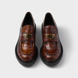 Chocolate crocodile-print leather loafers