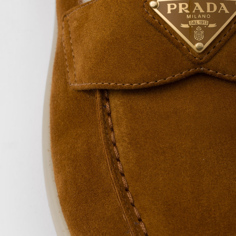 Suede and shearling loafers