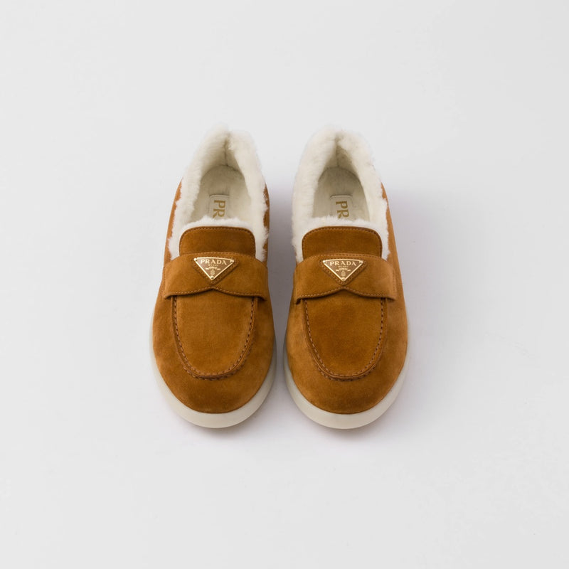 Suede and shearling loafers