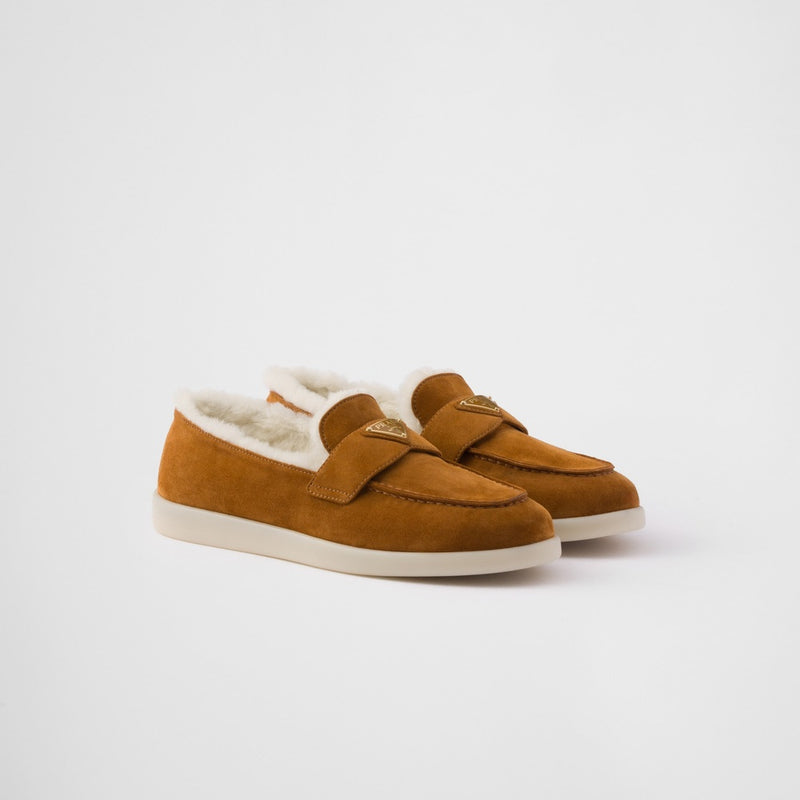 Suede and shearling loafers