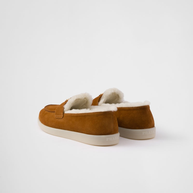 Suede and shearling loafers