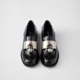 Brushed leather loafers with metal details