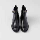 Brushed leather ankle boots with strap