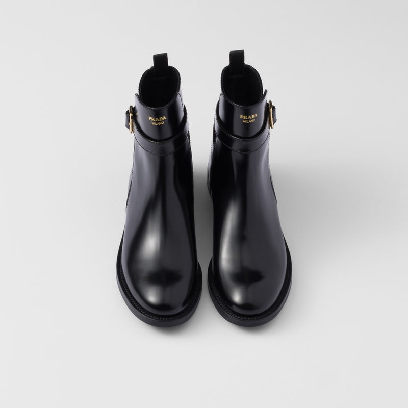 Brushed leather ankle boots with strap