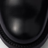 Brushed leather ankle boots