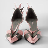 Two-tone patent leather D'Orsay pumps