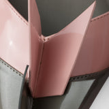 Two-tone patent leather D'Orsay pumps