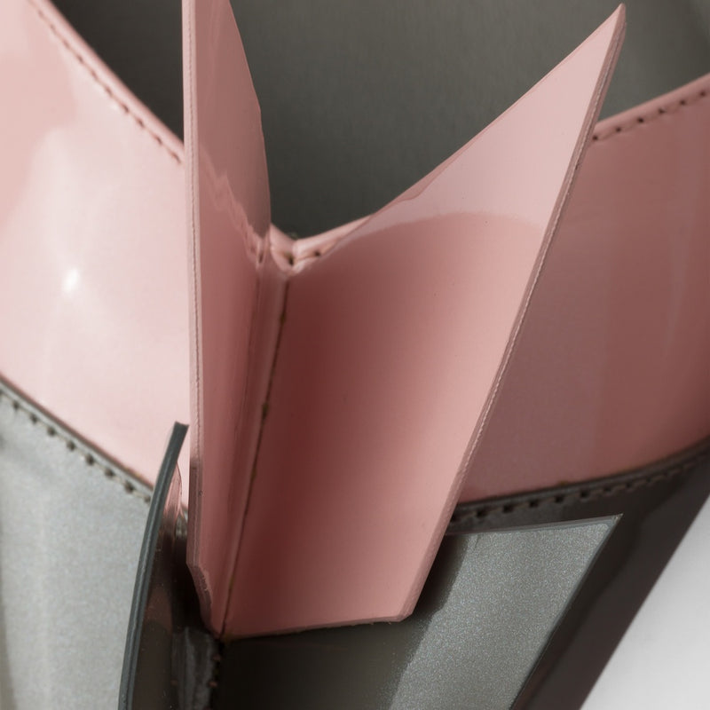 Two-tone patent leather D'Orsay pumps