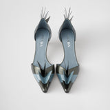 Two-tone patent leather D'Orsay pumps