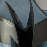 Two-tone patent leather D'Orsay pumps